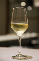 refinement and indulgence, a fancy wine glass in a restaurant represents a celebration of taste, culture, and socializing. It evokes feelings of luxury, pleasure, and conviviality