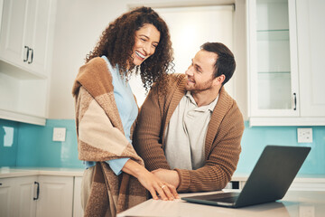 Happy couple, laptop and smile for search, internet or social network with video in home kitchen....