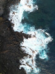 waves crashing on rocks