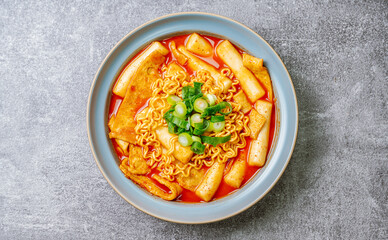 Rabokki, Korean style Stir-fried Instant Noodle : This dish is tteokbokki with ramen noodles. Tteokbokki is a spicy dish made with rice cake, vegetables, and fish cake, all stir-fried together in a go