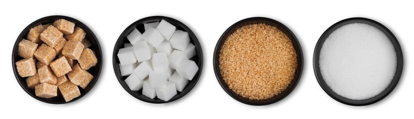 Black bowl plates of natural brown and white unrefined sugar and sugar cubes on white background.