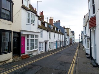 victorian terraces in england. street with english houses or homes