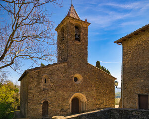Fototapeta na wymiar View of the main facade of the Church of Sant Roma de Joanetes, Garrotxa, Catalonia, Spain