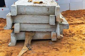 Large reinforced concrete structures at the construction site. Preparation for the installation of...
