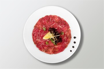 Tasty fresh raw meat in plate