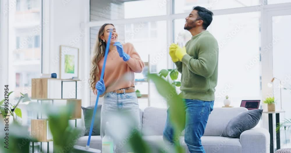 Poster Dance, singing and a couple cleaning the living room of their home together while having fun with housework. Love, dancing or music with a man and woman cleaner in their house for a spring clean