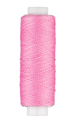 Spool with pink thread for sewing, supply for sewing, isolated object 
