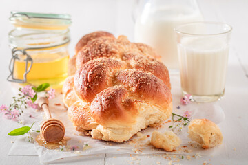 Fresh golden challah with milk and honey.