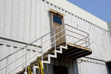 Iron staircase for up to workshop. The door are on the upstairs.    