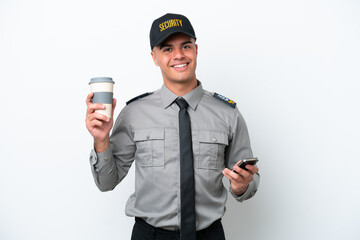 Young caucasian security man isolated on white background holding coffee to take away and a mobile