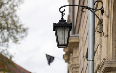 Fototapeta na wymiar Old wall street lighting in the Old Town of Krakow