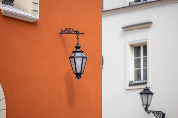 Fototapeta na wymiar Old wall street lighting in the Old Town of Krakow