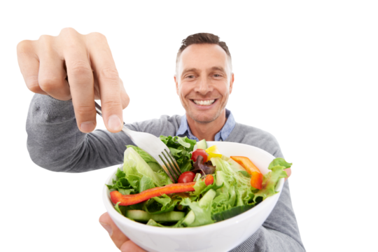 Healthy food, closeup of salad and portrait of man with smile, nutrition and care isolated on transparent png background. Health, happiness and hungry male model eating vegetable bowl for vegan diet.