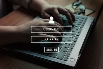 Woman using laptop with VR interface of secure access to user's personal information. Sign in or...