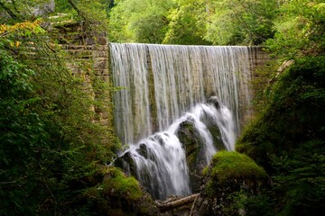 Fototapeta na wymiar waterfall in the mystery forest