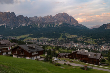 Fototapeta premium Cortina d'Ampezzo, the biggest mountain towns of Dolomites, Italy during sunset in summer