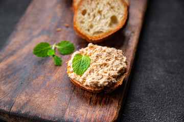 rillettes fish salmon sandwich smorrebrod seafood aperitif food meal food snack on the table copy space food background rustic top view