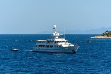 Fototapeta na wymiar Luxury yacht sailing near the Peljesac peninsula on the coast of the Adriatic sea. Croatia.