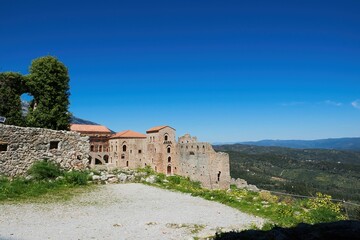 Fototapeta na wymiar medieval architecture, the castle town of Mystras. church in medieval city. Mistras, Greece