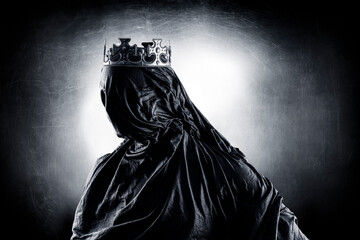 Ghost of a queen or king over dark misty background