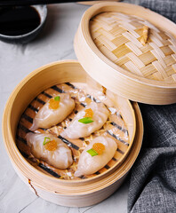 Steamed shrimp dumplings dim sum with pike caviar