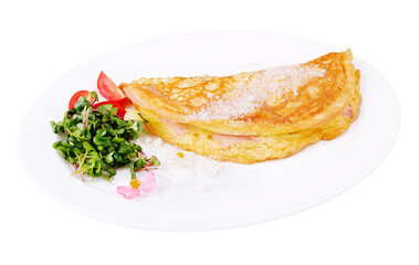 Omelette with ham cherry tomatoes on plate
