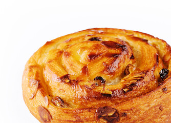Sweet baked snail with raisins and almond