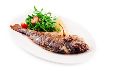 Baked sea bream fish with arugula salad and tomatoes