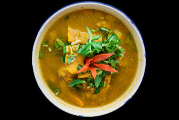 Vietnamese pumpkin Soup on black background