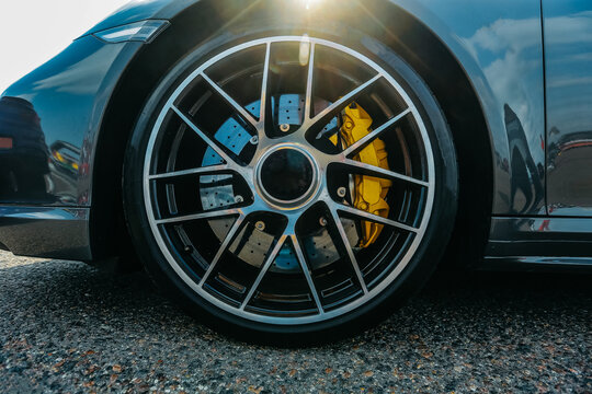 Alloy wheel Skill Forged with calipers and racing brakes Wilwood of sport car. Racing brake disc and low profile tyres. Tires of race car, drag and drift cars