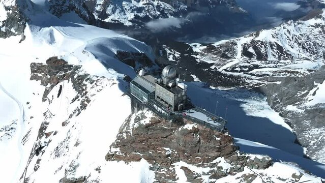 Aerial panorama view of the Sphinx Observatory on Jungfraujoch - Top of Europe, one of the highest observatories in the world located at the Jungfrau railway station, Bernese Oberland, Switzerland.