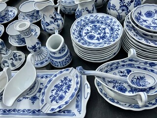 porcelain plates and dishes on table