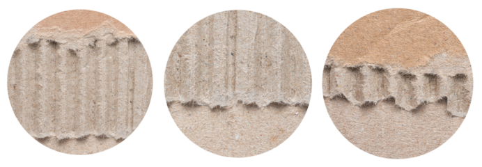 Set of isolated round pieces of corrugated crumpled ripped blank brown cardboard paper with sharp edge
