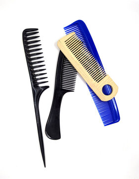 lot of combs on a white background.