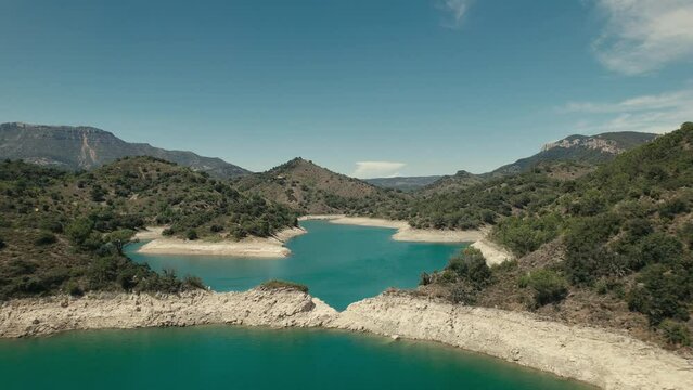 Lake and river in the mountains of Catalonia drone footage