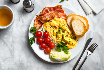 Breakfast with scrambled eggs and bacon