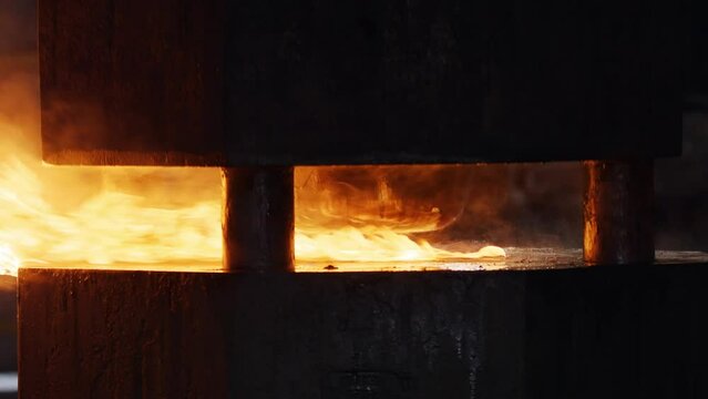Metal forging for aerospace parts using industrial forging press with red hot metal