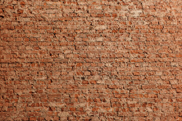 Old red brick wall without plaster