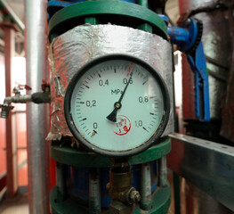 Complex system of pumps , manometers, pipelines, faucets and valves. Production hall of the biggest in Ukraine boiler-house using wood chips.