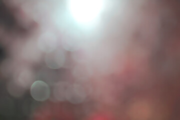 Abstract circular bokeh background of car in city at night.