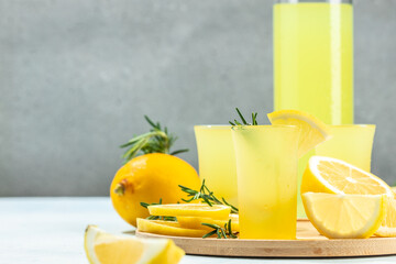 limoncello. traditional strong alcoholic drink and lemons. banner, menu, recipe place for text, top view