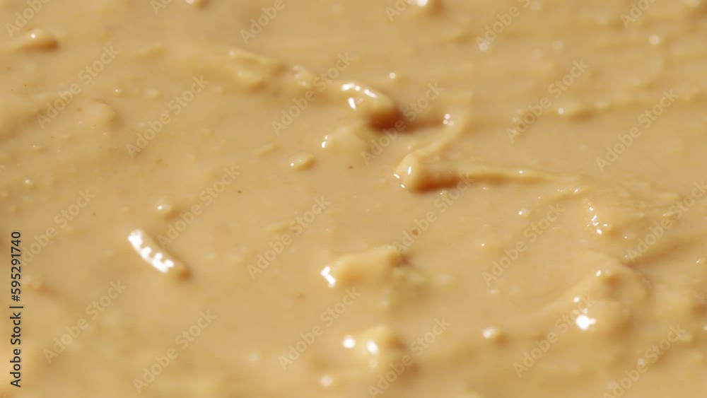 Poster peanut butter close-up rotates in a circle