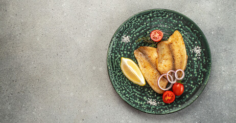 Fried fillet of sea white fish. Healthy food concept. place for text, top view