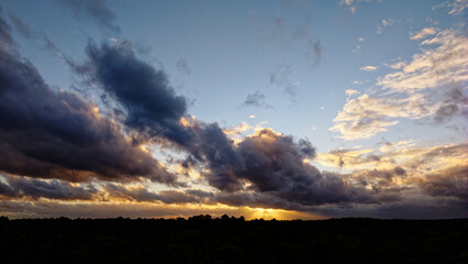 Fototapeta premium Beautiful dramatic sky sunset over the nature