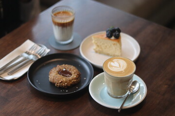 latte art on te wood table in the coffee shop