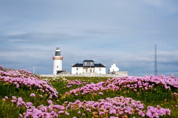 Still image of Hook Head lighthouse in bright cloudy day