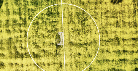 Soccer field in the countryside, aerial view from drone