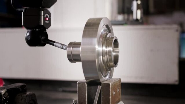 Close up of coordinate measurement machine CMM for high precision part inspection during production