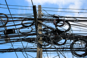 Electricity wires very tangled.