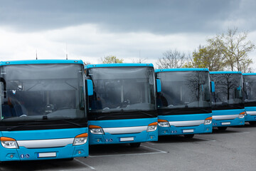 lined up busses at a bus station